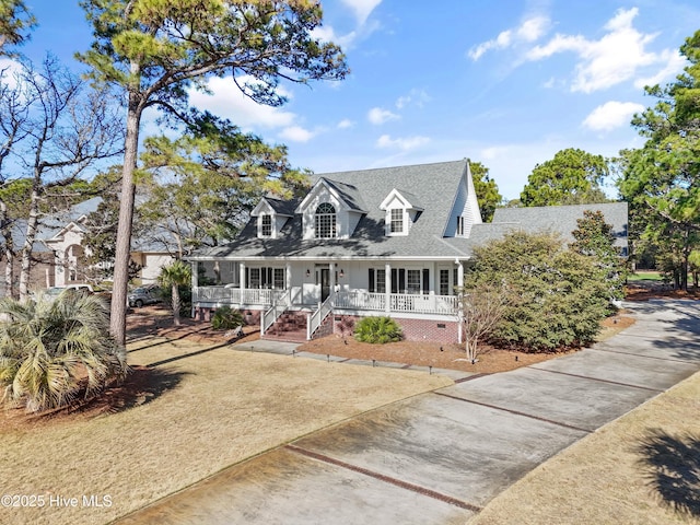 cape cod house with covered porch