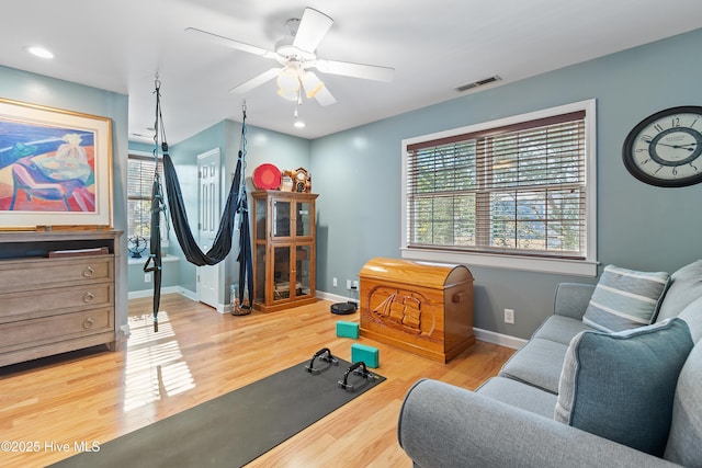 interior space featuring ceiling fan and wood-type flooring