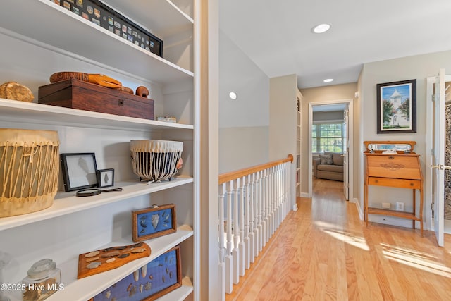 corridor featuring light hardwood / wood-style flooring