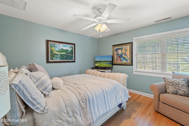 bedroom featuring ceiling fan and light wood-type flooring