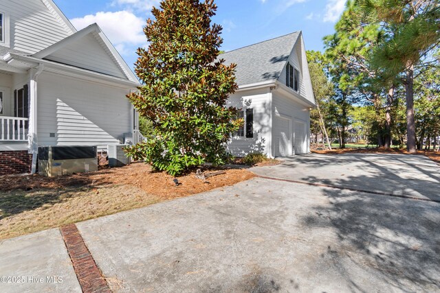 view of home's exterior with a garage