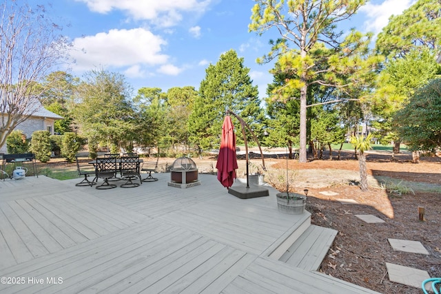 deck featuring a fire pit