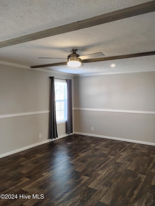 empty room with ceiling fan, dark hardwood / wood-style flooring, ornamental molding, and a textured ceiling