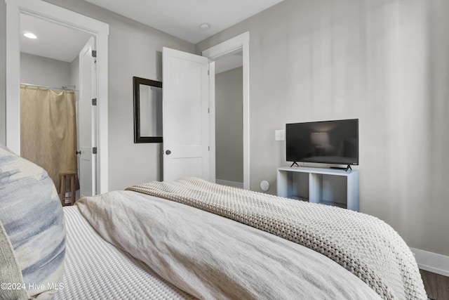 bedroom featuring hardwood / wood-style floors