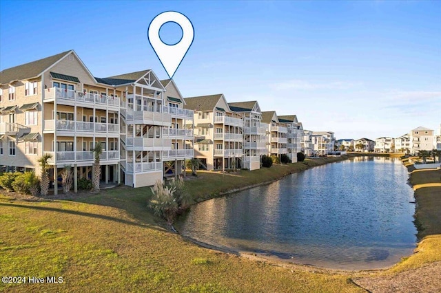 view of building exterior featuring a water view