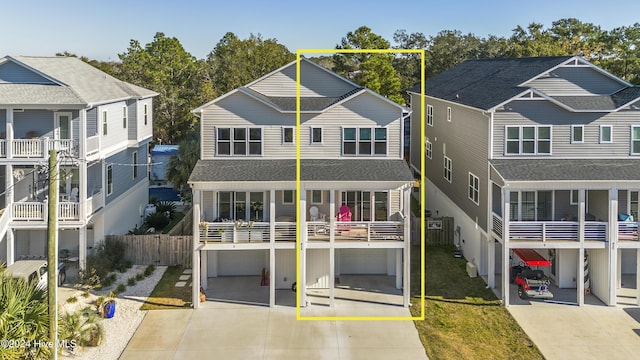 view of front of home featuring a balcony