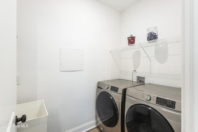 laundry room featuring washer and dryer