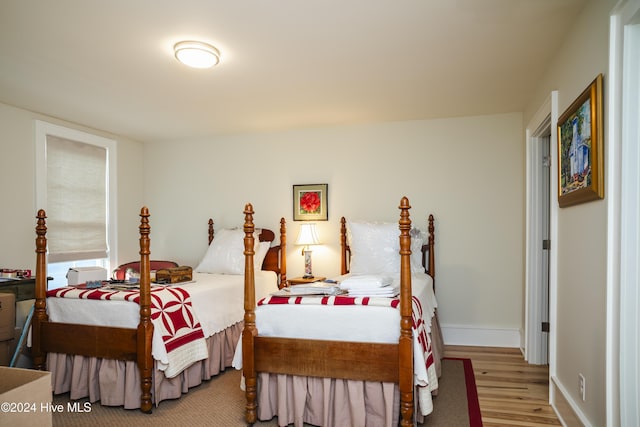 bedroom featuring light wood-type flooring