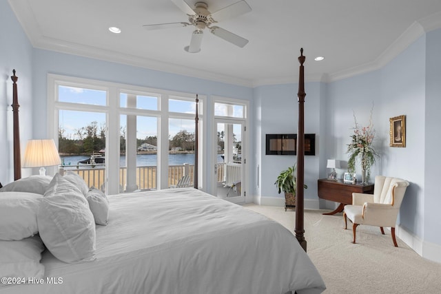 bedroom with light carpet, ceiling fan, crown molding, and a water view