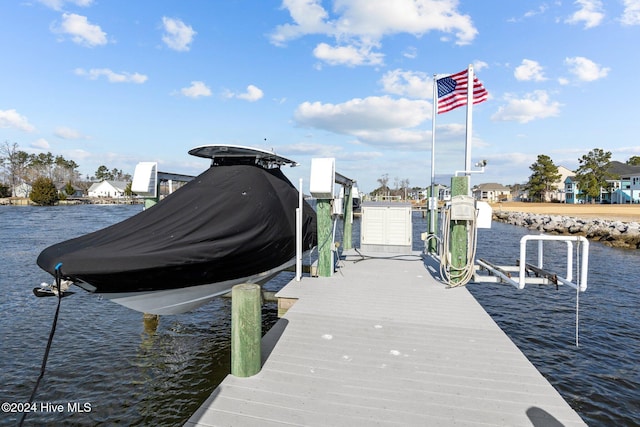 view of dock with a water view