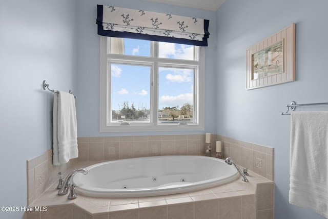 bathroom with a relaxing tiled tub