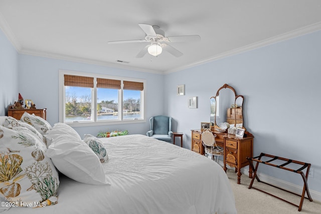 bedroom with ceiling fan, light colored carpet, and ornamental molding