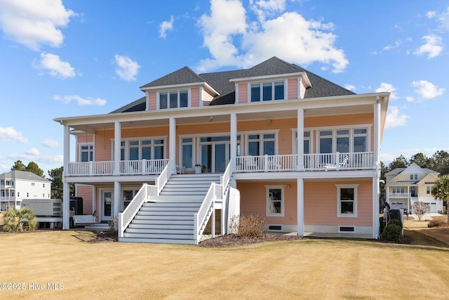 view of front facade featuring a front lawn and a porch