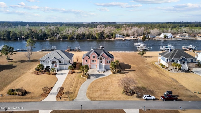 bird's eye view with a water view