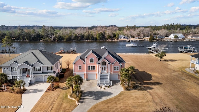 bird's eye view with a water view