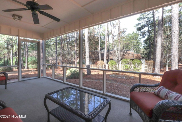 sunroom with ceiling fan and a healthy amount of sunlight