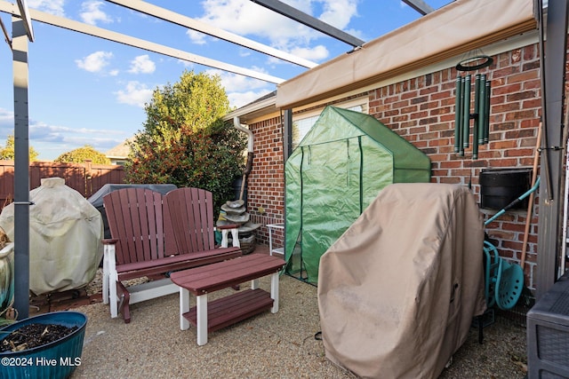 view of patio with a grill