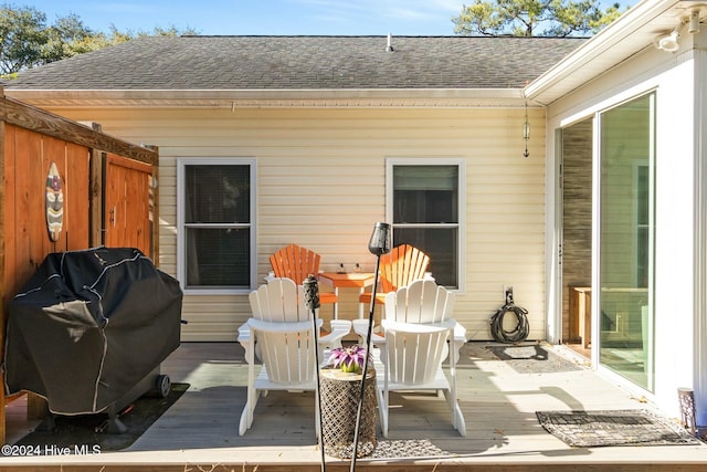 view of patio / terrace featuring grilling area and a wooden deck