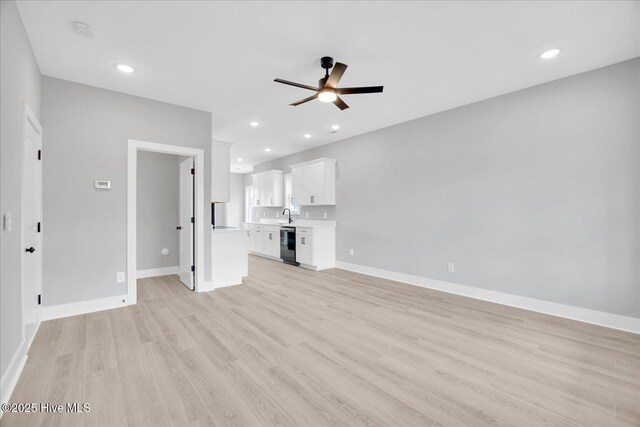 interior space featuring ceiling fan and dark hardwood / wood-style floors