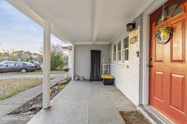 entrance to property with a porch