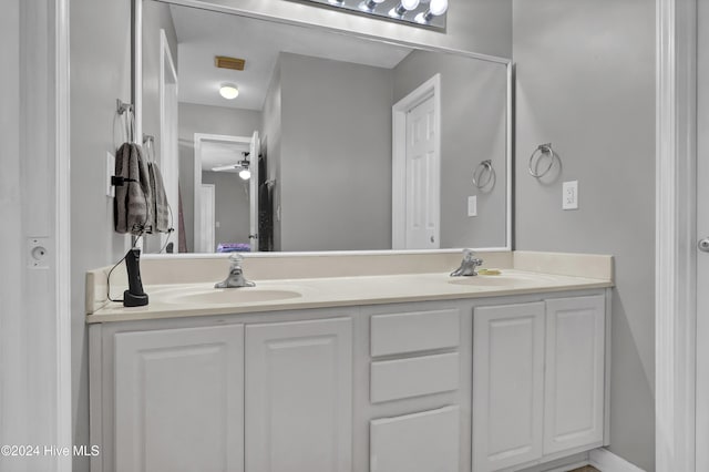 bathroom featuring vanity and ceiling fan