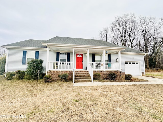 single story home featuring a garage, a porch, and a front lawn