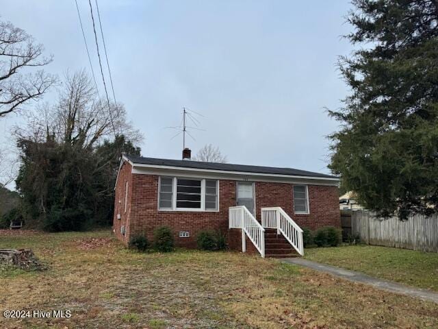 view of front of house with a front lawn