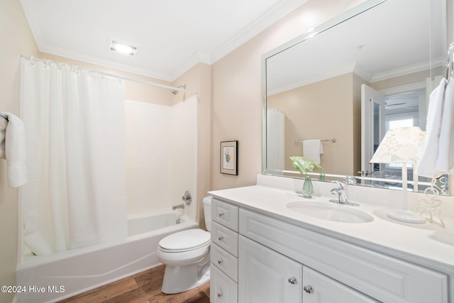 full bathroom featuring shower / bath combination with curtain, ornamental molding, vanity, hardwood / wood-style floors, and toilet