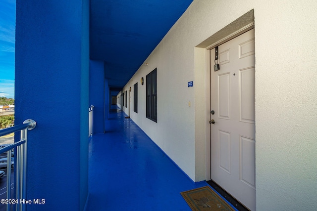 entrance to property featuring a balcony