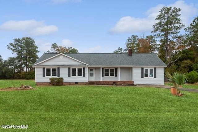 single story home featuring a front yard