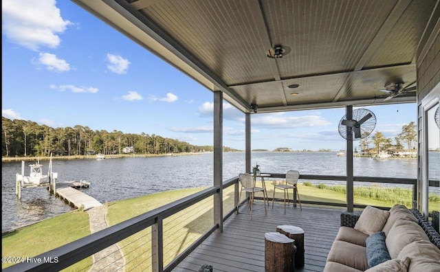 dock area featuring an outdoor living space and a water view