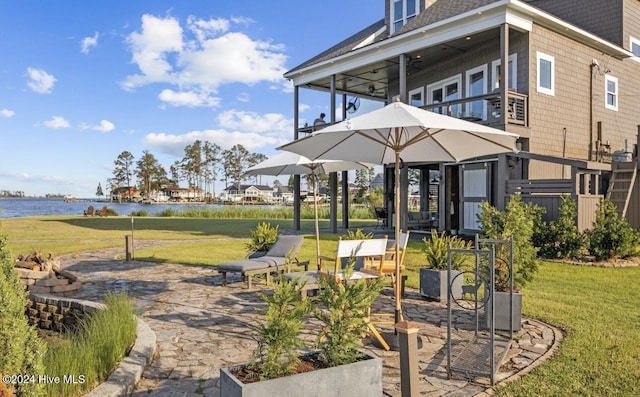 view of patio / terrace featuring a water view