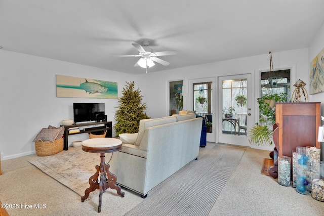 living room featuring ceiling fan