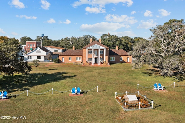 exterior space featuring a lawn