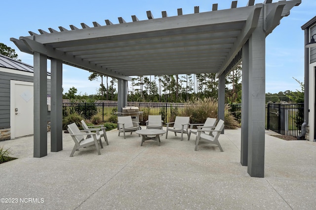 view of patio featuring a pergola and a grill