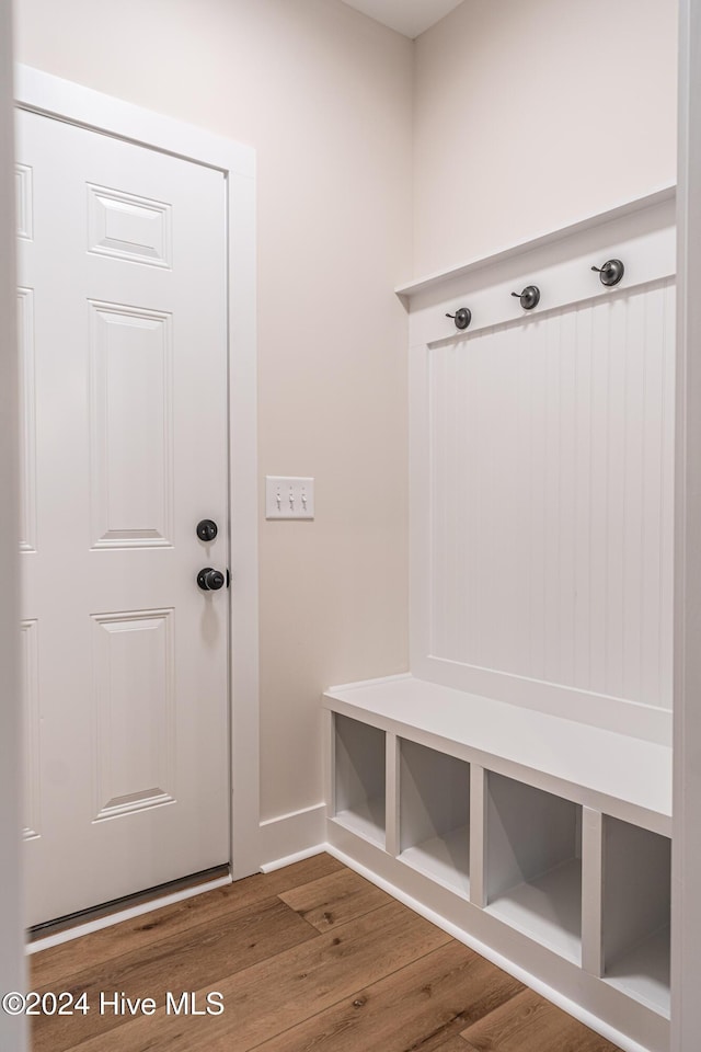 1725 Longleaf Dr E, Pinehurst, NC 28374 - mudroom with baseboards and wood finished floors