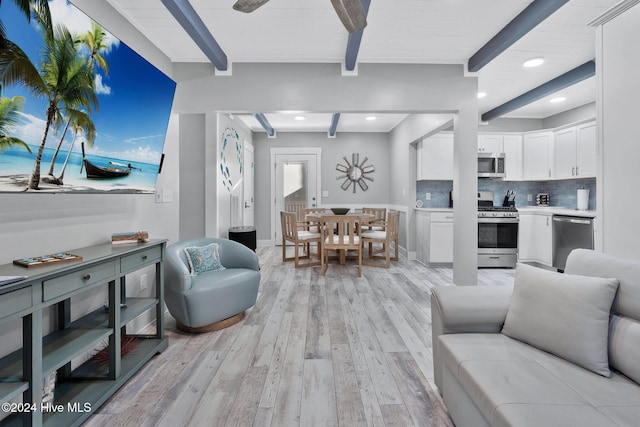 living room with light hardwood / wood-style flooring, beam ceiling, and wood ceiling