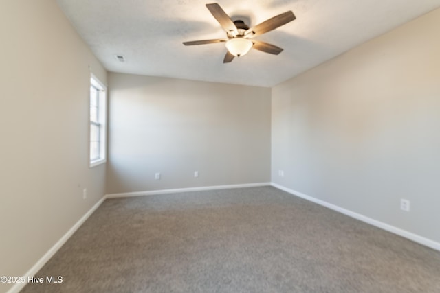 carpeted empty room with ceiling fan