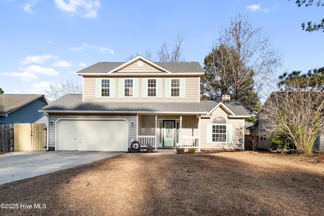 view of property featuring a garage and a porch