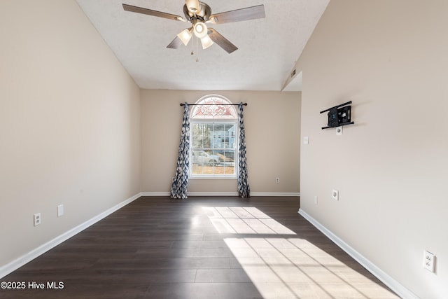 unfurnished room with hardwood / wood-style flooring, ceiling fan, and a textured ceiling