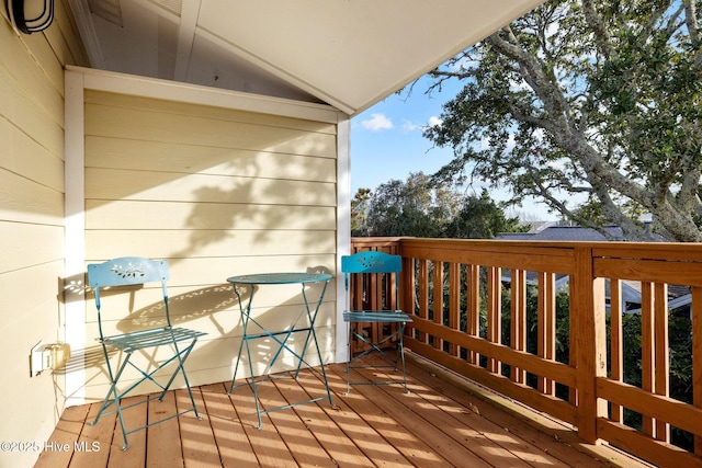 wooden balcony with a wooden deck