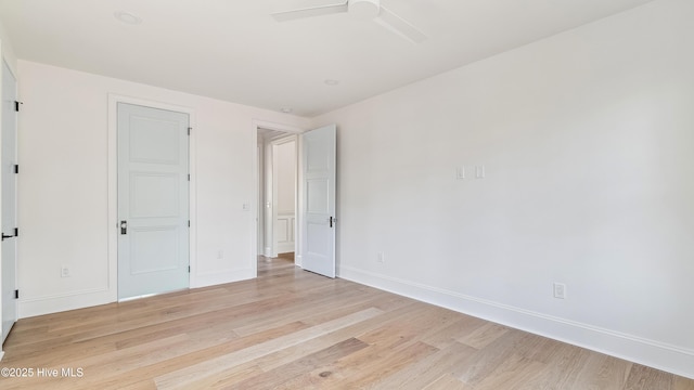 unfurnished bedroom featuring ceiling fan and light hardwood / wood-style floors