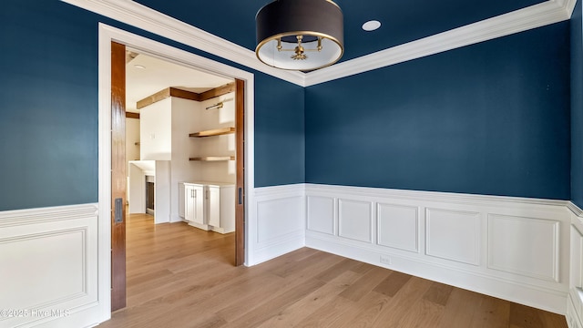 spare room featuring light hardwood / wood-style flooring