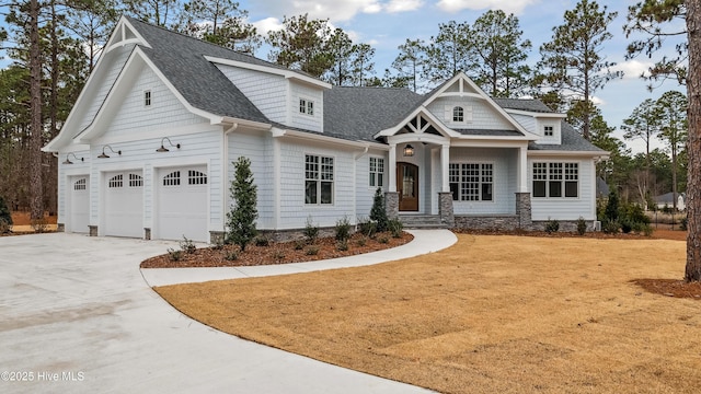 craftsman inspired home featuring a garage