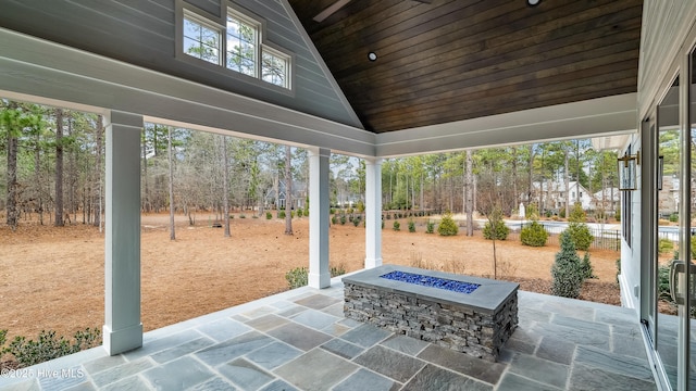 view of patio featuring an outdoor fire pit