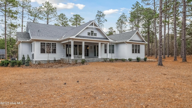 view of front of house with a sunroom