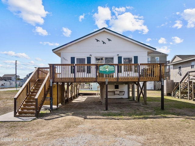 view of front of home with a wooden deck