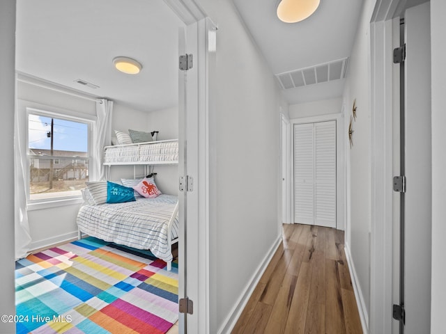 bedroom featuring hardwood / wood-style flooring