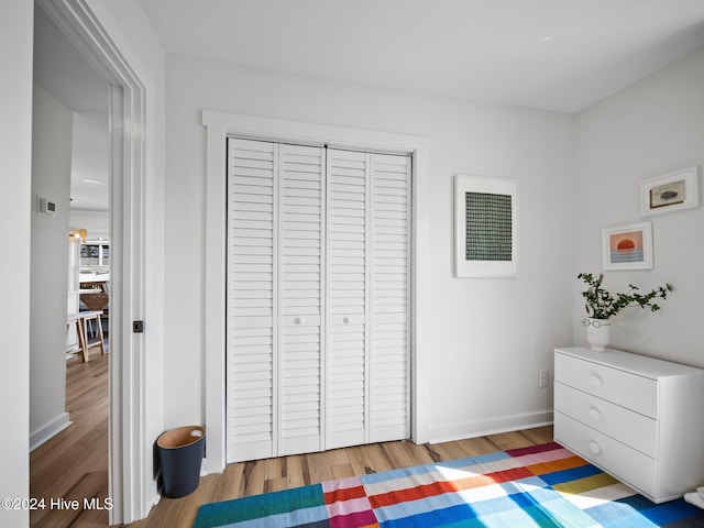 bedroom with light wood-type flooring