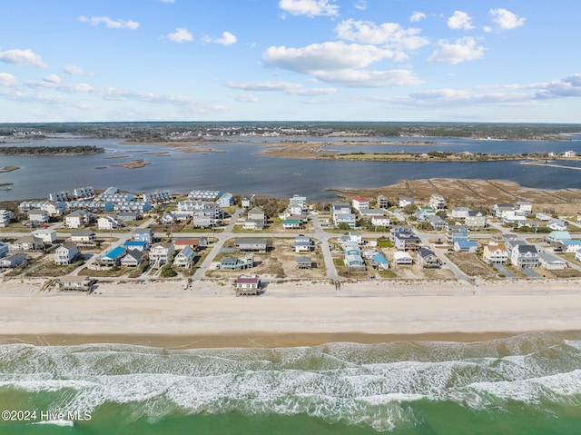 aerial view featuring a water view and a beach view